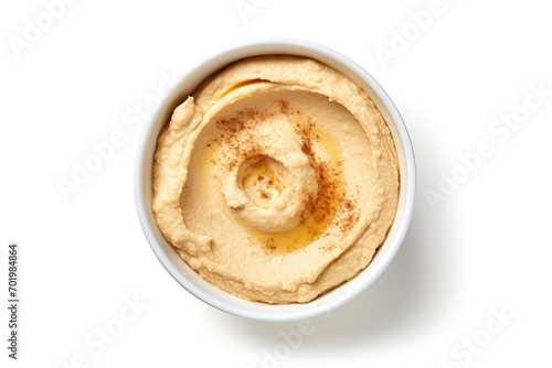 Isolated white background top view of hummus bowl photo