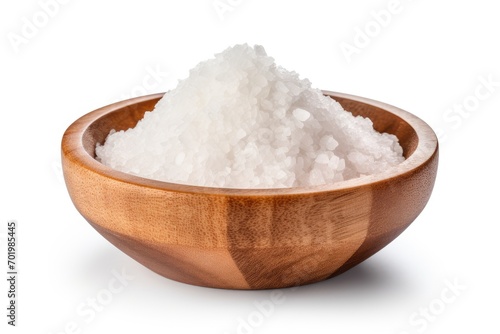 Pure sea salt in wooden bowl on white background with clipping path
