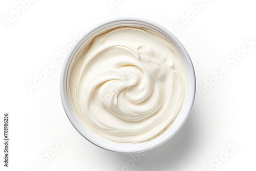 Top view of a white background with a cream filled bowl