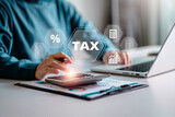 E-Filing, Taxpayer using a laptop to file taxes personal income, Tax Return form online for tax payment. Government, state taxes. Data analysis, paperwork, reports. Calculation tax return.