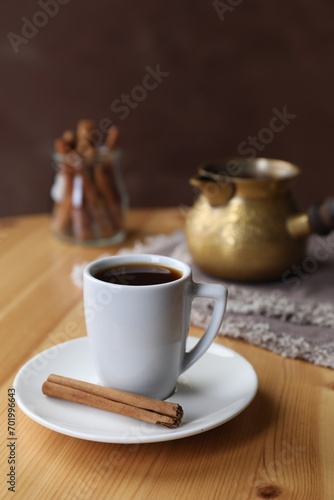 Turkish coffee. Freshly brewed beverage on wooden table