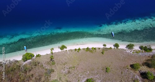 Aerial View of Nunsa Tiga, an island in the 17 Island Marine Park in East Nusa Tenggara, Indonesia.  photo