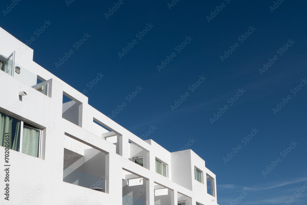 Modern White Buildings Under Blue Sky
