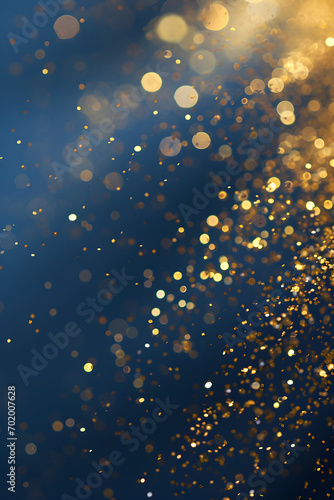 Gold confetti on blue background. Golden sparkle, glitter dust. Abstract design Happy New Year card, greeting, Xmas holiday celebrate. Shine trail tail magic comet
