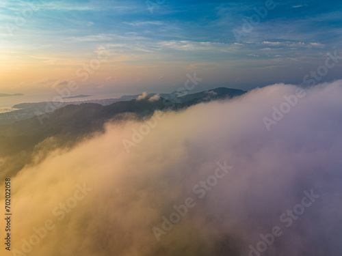 .aerial view fog cover Phuket big Buddha..A fluffy mist covers the Phuket Big Buddha..Fog cover Phuket white big Buddha is the famous landmark in Phuket..