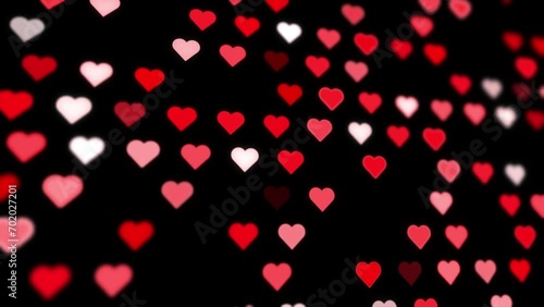 Beautiful seamless loop hearts pattern on black background.