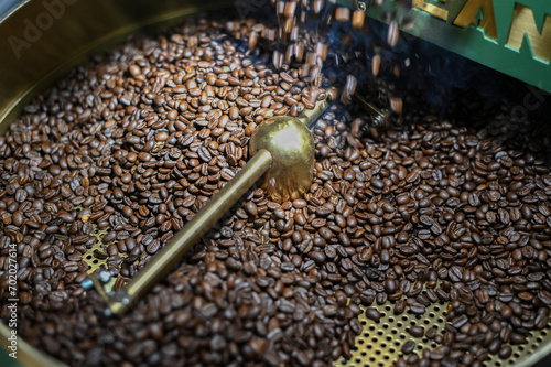 Release the coffee beans from the roaster.
