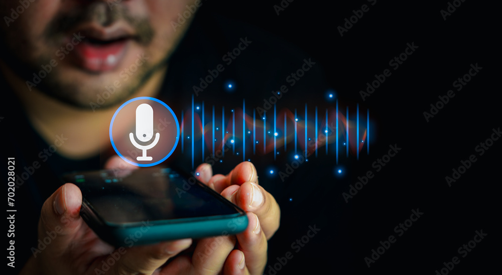 Close up of man holding in hand smart phone talking with digital assistant or friend distantly uses easy voice messaging, concept of modern ai technology use voice to direct - obrazy, fototapety, plakaty 
