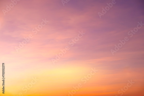 Fototapeta Naklejka Na Ścianę i Meble -  	
Enjoy a panoramic view of the skyline. The sun rises in the morning sky with colorful clouds. and beautiful cloud patterns In the soft light of the morning	
