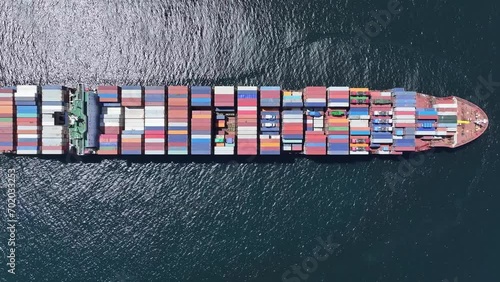 Overhead view of loaded container ship plying the trade routes around the Cape of Good Hope, South Africa.  photo