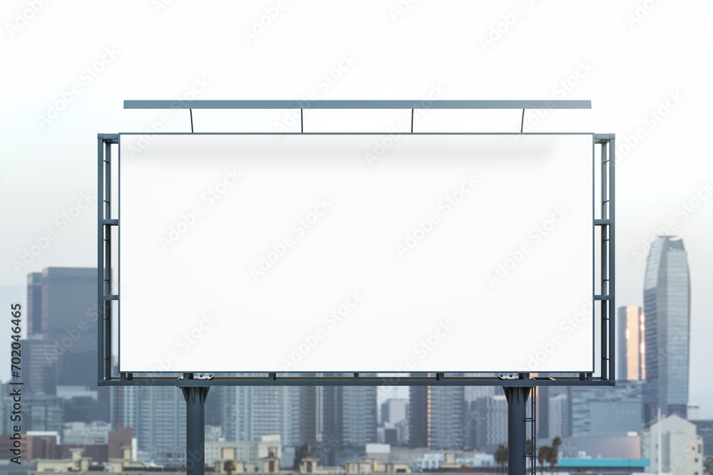 Blank white billboard on cityscape background at daytime, front view. Mock up, advertising concept Blank white billboard on cityscape background at daytime, front view. Mock up, advertising concept