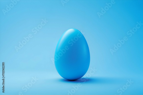 blue easter egg on blue background