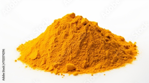 an isolated pile of vibrant yellow curry powder on a white background, showcasing the blend of aromatic spices in a visually striking arrangement.