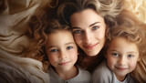 Mother and her two children in bed, March 8 World Women's Day