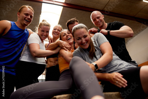 People laughing together at a gym