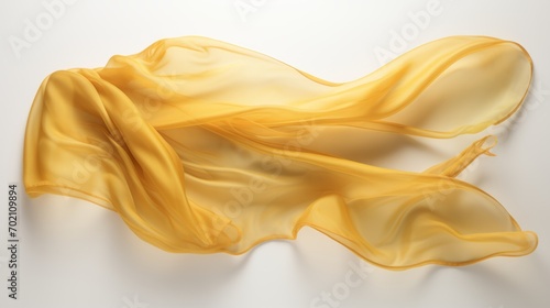 Yelloow cloth that is floating and hiding something unknown underneath. Fabric isolated on white background. 
