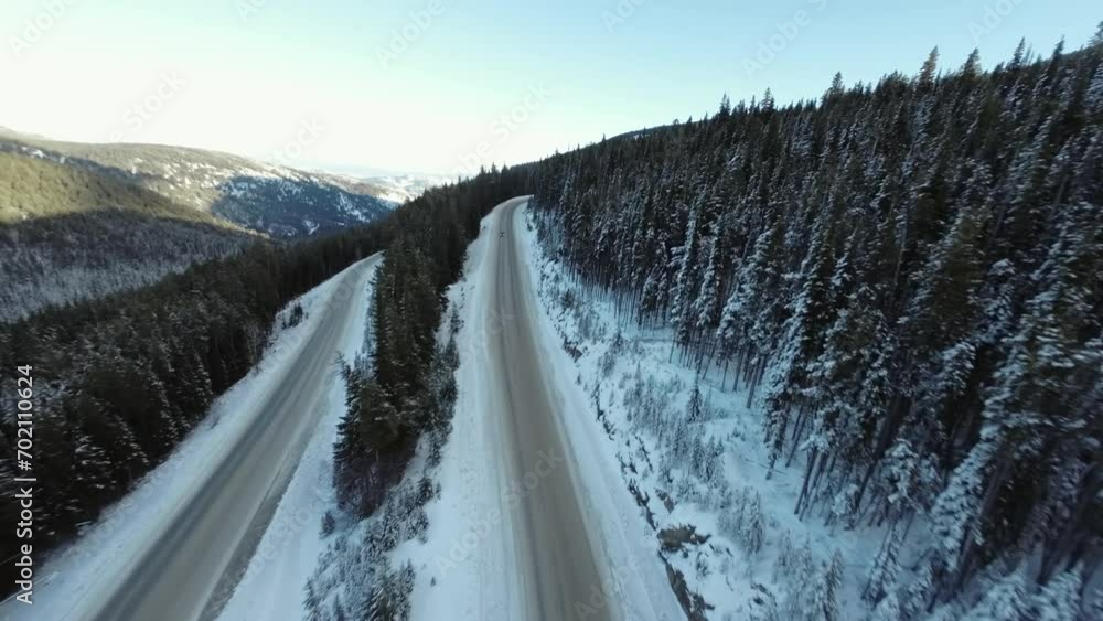 Aerial FPV Flying over the Snow Covered Canadian Mountain Landscape. British Columbia, Canada. Dynamic Cinematic. High quality 4k footage Aerial FPV Flying over the Snow Covered Canadian Mountain Landscape. British Columbia, Canada. Dynamic Cinematic. High quality 4k footage