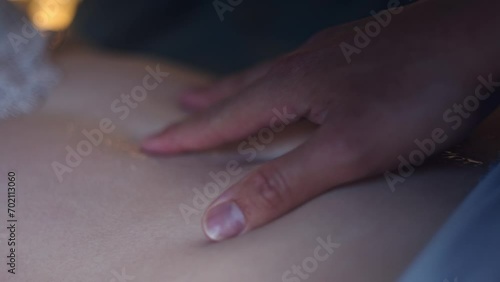 Man Touch And Slides Finger On Woman's Belly Lying In Bed. - close up shot photo