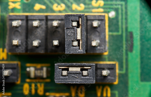 Detail of old electronic components soldered to its motherboard