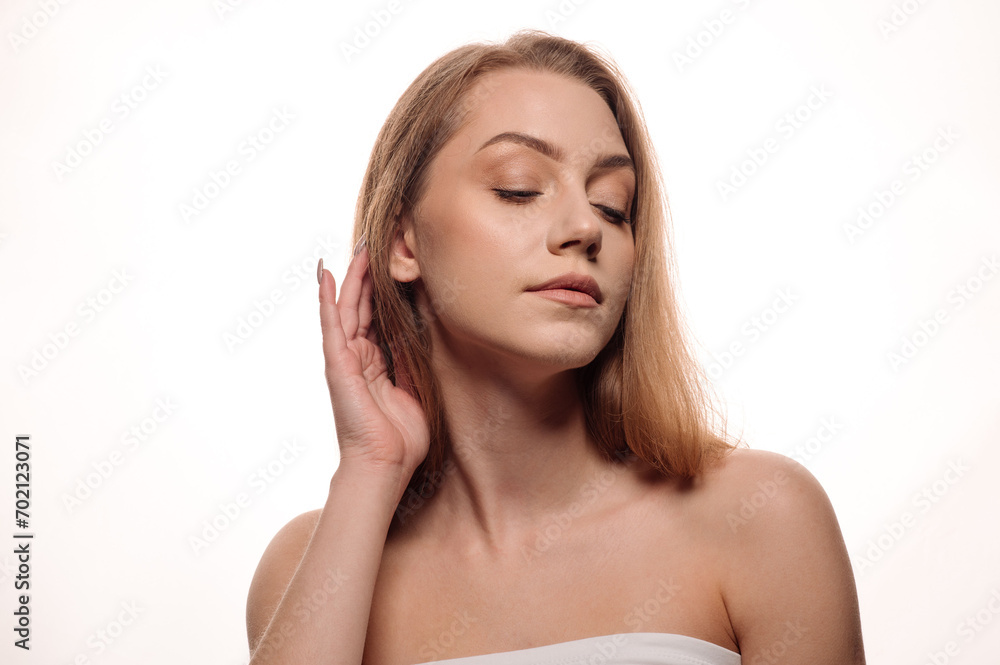 Beauty portrait of pretty blonde girl on white isolated background. Skin care concept Beauty portrait of pretty blonde girl on white isolated background. Skin care concept
