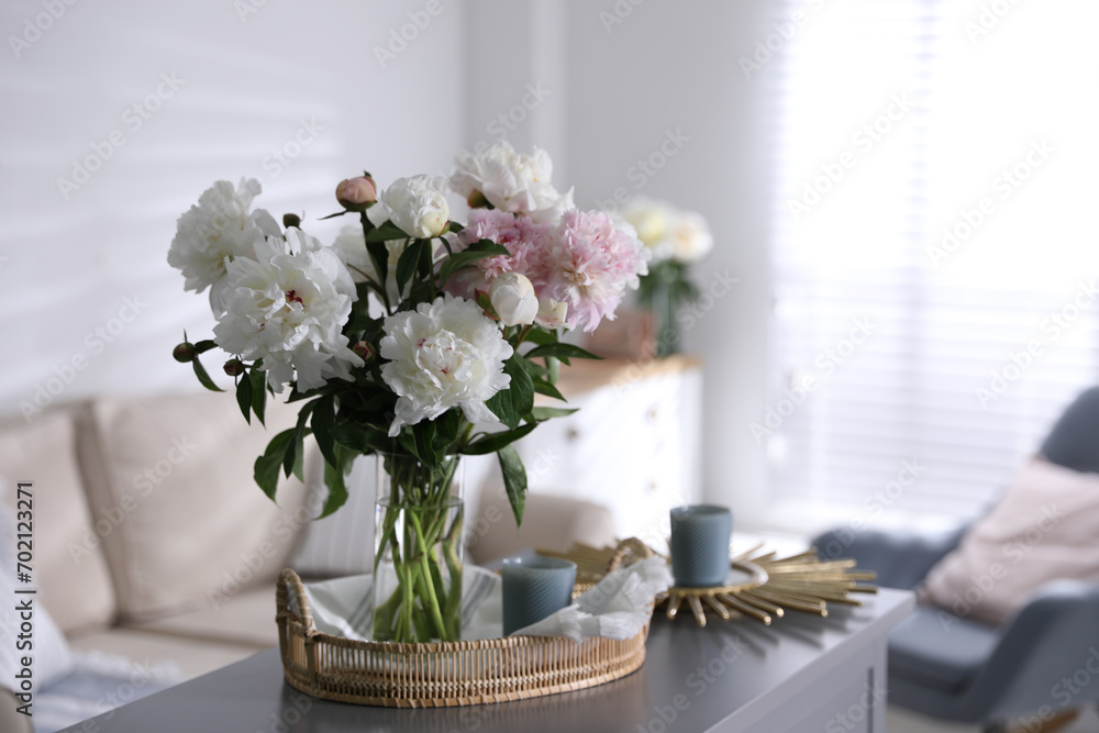 Bouquet of beautiful peony flowers on table indoors. Space for text Bouquet of beautiful peony flowers on table indoors. Space for text