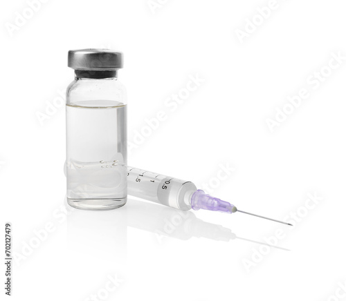 Disposable syringe with needle and vial isolated on white