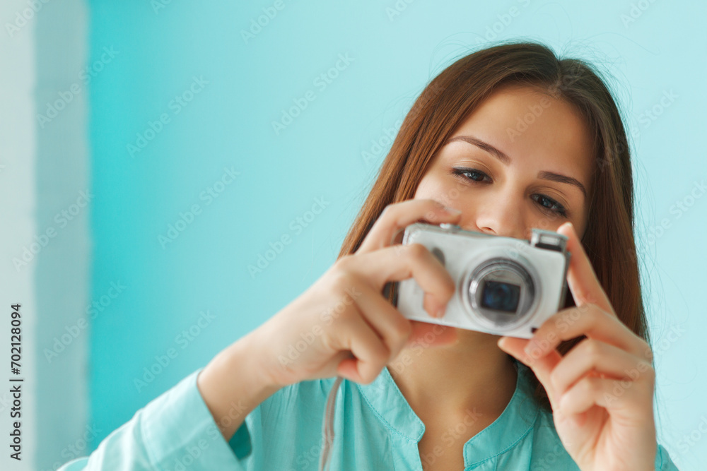 Portrait of a beautiful cute teen girl with digital photo camera Portrait of a beautiful cute teen girl with digital photo camera