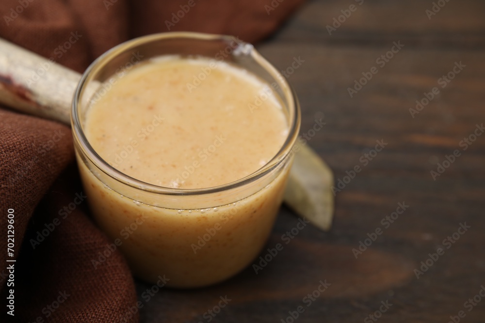 Delicious turkey gravy on wooden table, closeup. Space for text Delicious turkey gravy on wooden table, closeup. Space for text