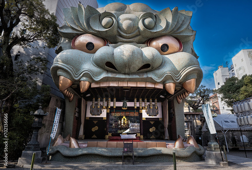 Osaka, Japan - Dec 29 2023 : Namba Yasaka-jinja one of Osaka’s most distinctive places of worship with gigantic lion head-shape building with huge open mouth that swallows evil spirits