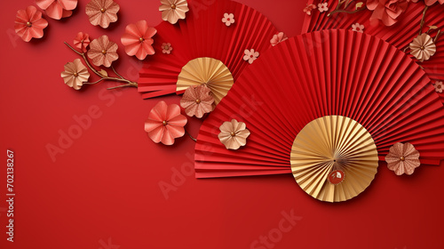 a beautiful arrangement of red and gold paper fans and flowers  creating a festive  ornamental  and cultural design