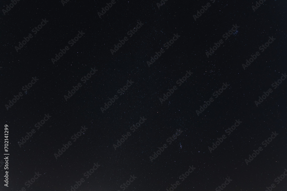 Photo background texture of the starry night sky.