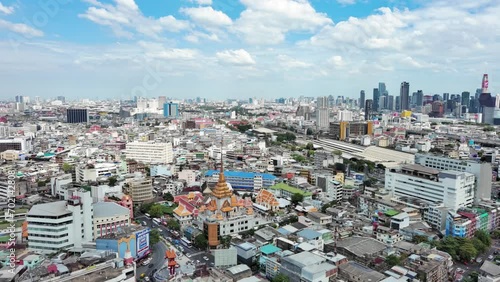 Bangkok, Thailand: Aerial view of Wat Traimit Withayaram Worawihan (Temple of the Golden Buddha), famous Buddhist temple in Thai capital city - landscape panorama of Southeast Asia from above photo