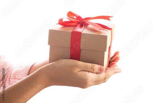 Women hand holding gift box isolated on white background © natrot