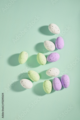 Easter eggs dotted on a blue background