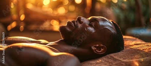 Black man spa and body massage for couple wellness relax therapy and skincare treatment Salon therapist touch muscle reflexology and healing of sleeping african guy on bed stress relief and zen