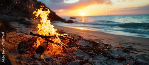 Camp fire by the beach duri...