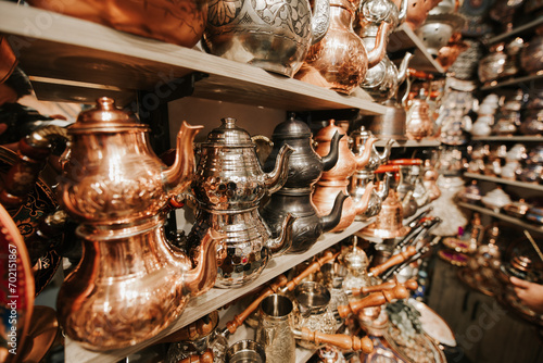 Fototapeta Naklejka Na Ścianę i Meble -  many traditional turkish copper teapot in a handicraft shop
