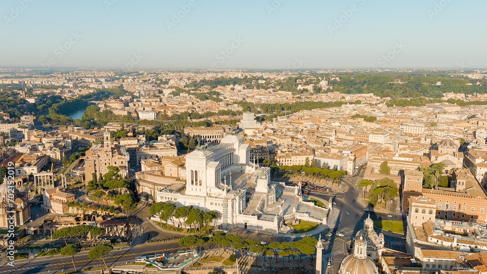 Rome, Italy. Vittoriano - Monument to the first king of Italy, Victor Emmanuel II. Flight over the city. Panorama of the city in the morning. Summer, Aerial View