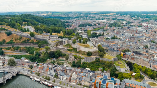 Namur, Belgium. Citadelle de Namur - 10th-century fortress with a park, rebuilt several times. Panorama of the central part of the city. River Meuse. Summer day, Aerial View