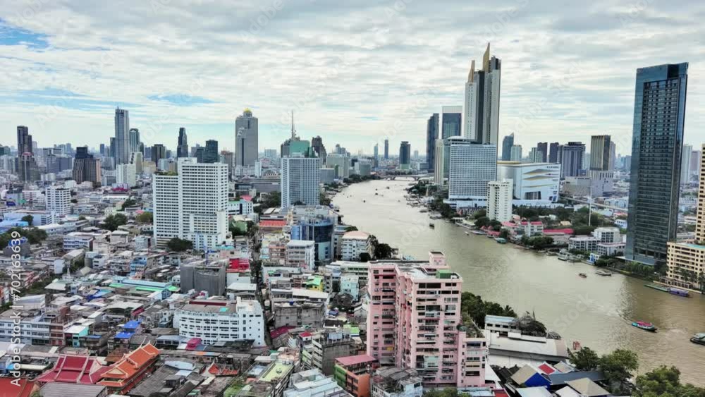 Bangkok, Thailand: Aerial view of skyscraper skyline of business district in Thai capital city, Chao Phraya River - landscape panorama of Southeast Asia from above Bangkok, Thailand: Aerial view of skyscraper skyline of business district in Thai capital city, Chao Phraya River - landscape panorama of Southeast Asia from above