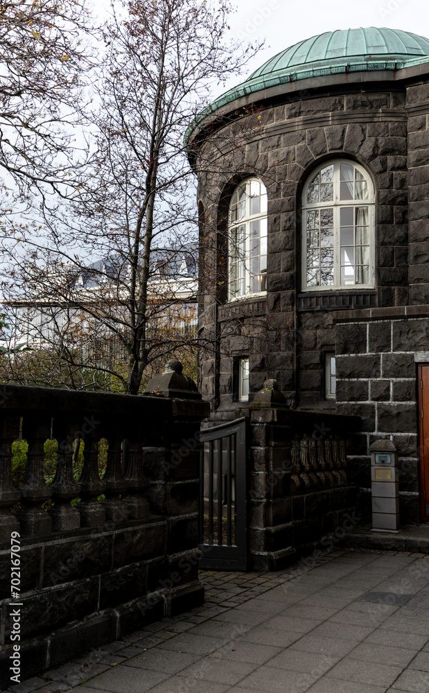 Detail of the exterior of the Icelandic Parliament, Althingi, Reykjavik, Iceland. Access to the gardens Detail of the exterior of the Icelandic Parliament, Althingi, Reykjavik, Iceland. Access to the gardens