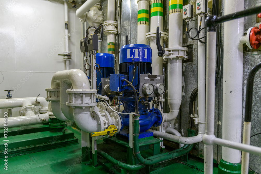  Water pump on ship. Engine room interior on big vessel.