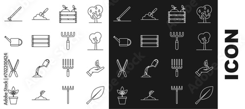 Set line Leaf, Sprout in hand of environmental protection, Tree, Wooden box for fruits vegetables, Watering can, Garden rake work and  icon. Vector