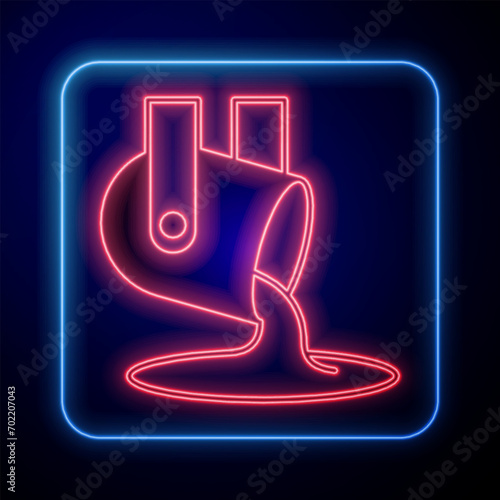 Glowing neon Molten gold being poured icon isolated on black background. Molten metal poured from ladle.  Vector