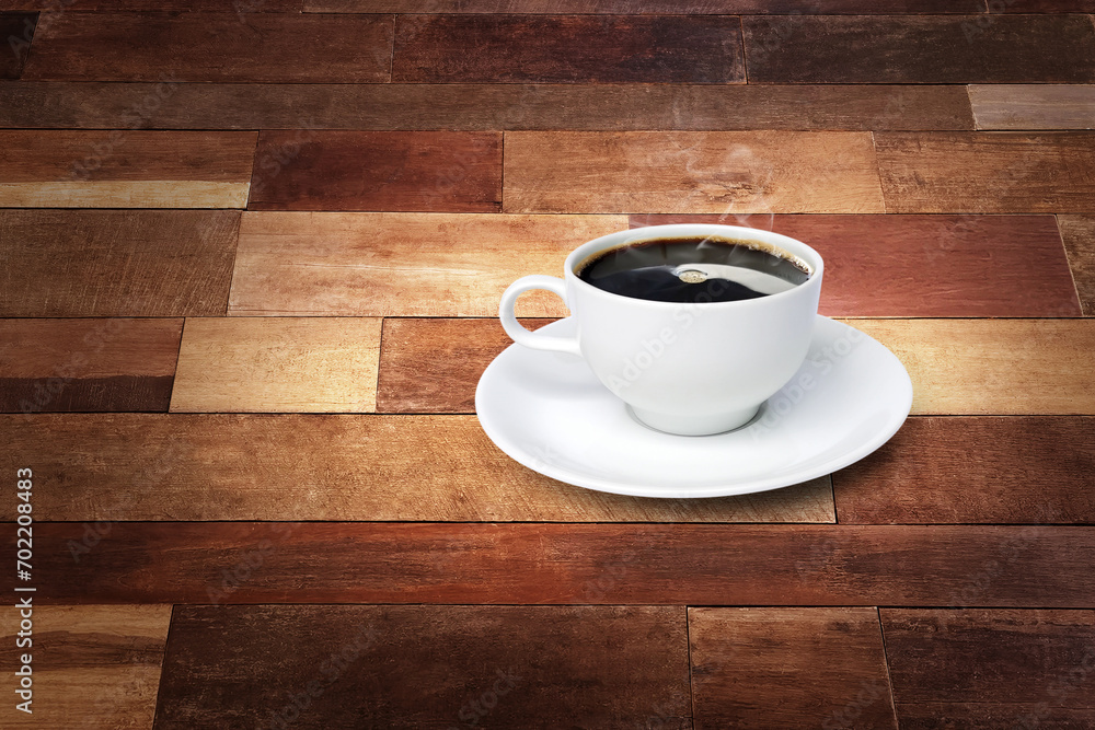 Obraz premium Coffee cup and white saucer on a wooden background