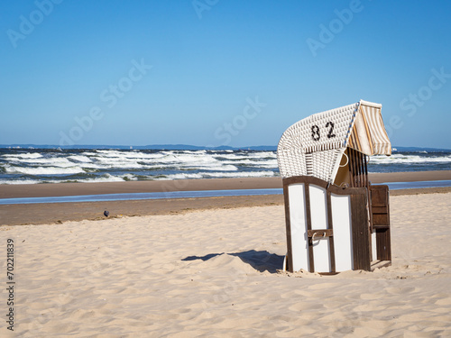 Beach chair in front of the baltic sea with clear blue sky - copy space