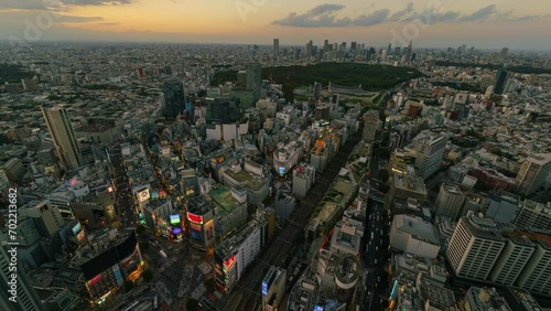Timelapse day to night transition of Shibuya district in Tokyo in Japan photo