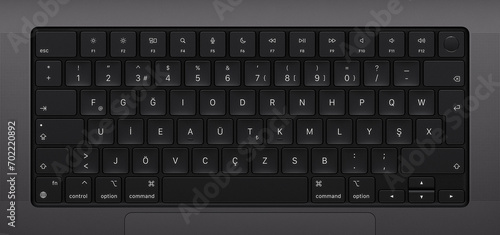 Modern laptop keyboard close up view photo