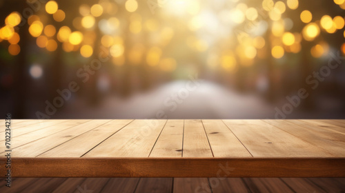The warm golden bokeh lights create a magical backdrop for the empty wooden surface, ideal for display or montage.