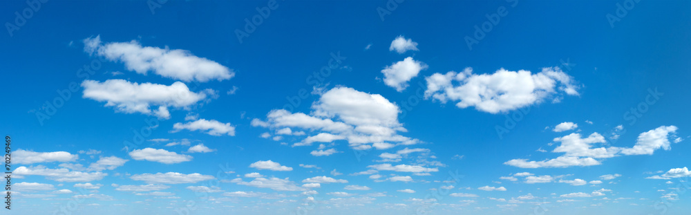Panorama Blue sky and white clouds. Bfluffy cloud in the blue sky background Panorama Blue sky and white clouds. Bfluffy cloud in the blue sky background